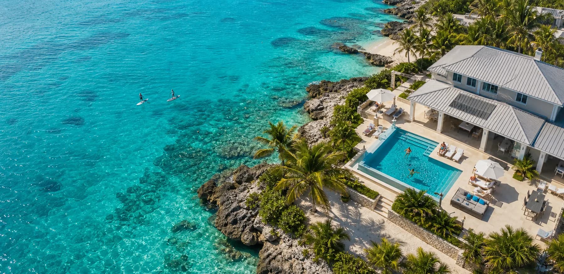 Luxury Cayman resort residence setting with pool and sea